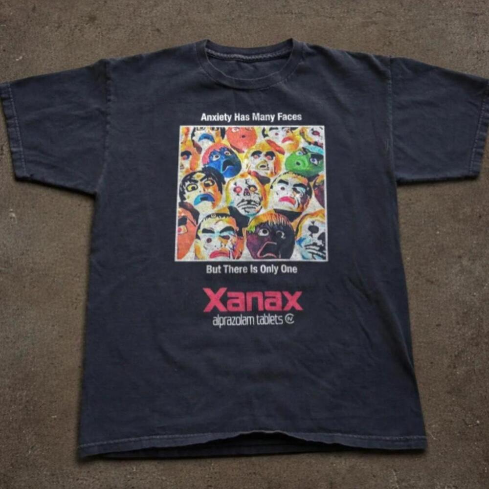 T-Shirt Xanax Anxiety Has Many Faces Graphic Tee (Size)